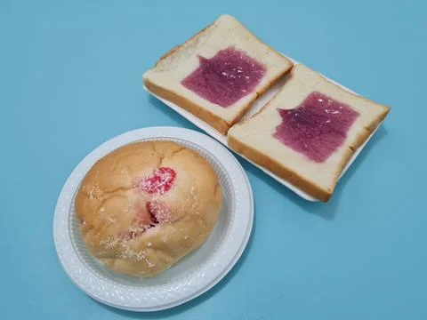 Bread with blueberry jam Stock Photos