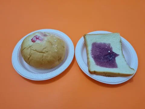 Bread with blueberry jam Stock Photos