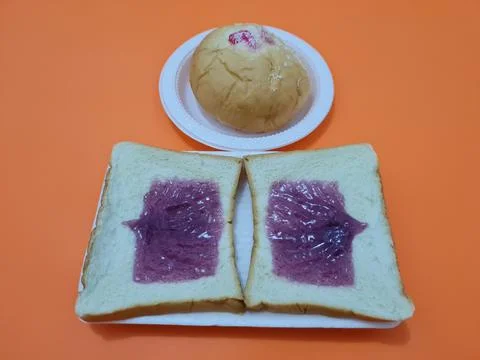 Bread with blueberry jam Stock Photos