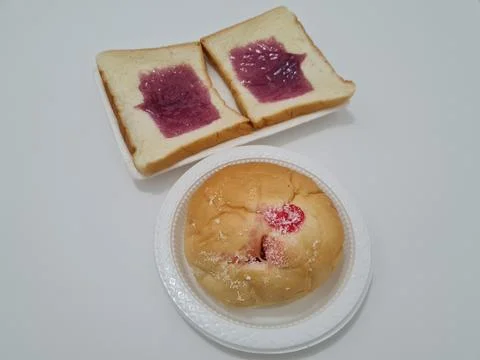 Bread with blueberry jam Stock Photos