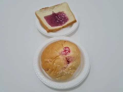 Bread with blueberry jam Stock Photos