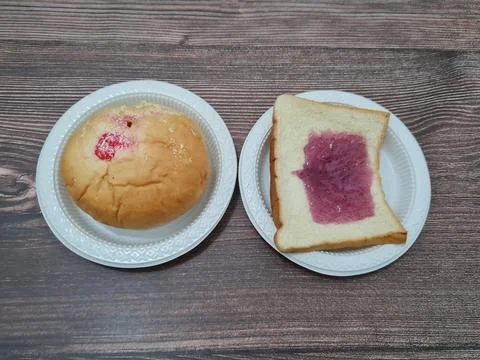 Bread with blueberry jam Stock Photos