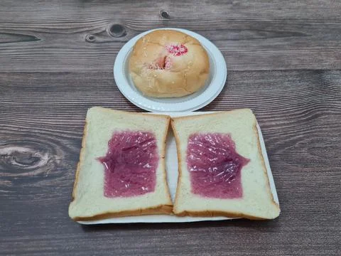 Bread with blueberry jam Stock Photos
