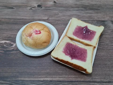 Bread with blueberry jam Stock Photos