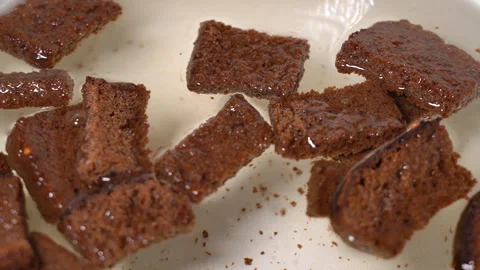 Bread is boiled in water to make kvass Stock Footage 253718953