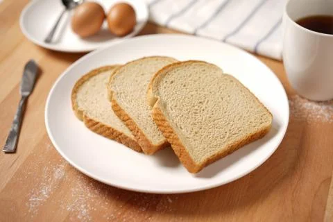 Bread on breakfast table Stock Photos