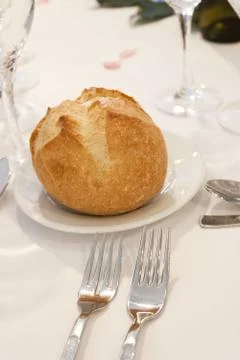 Bread bun on a plate. Stock Photos