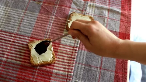 Bread butter and jam breakfast Video stock 75804997