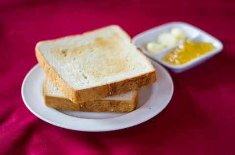 Bread with butter Stock Photos