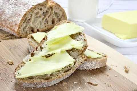 Bread with butter Stock Photos