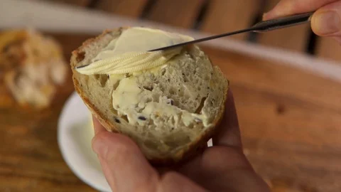 A bread with butter is ready to be eaten Stock-Footage 130118346