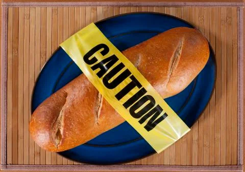 Bread with caution tape Stock Photos