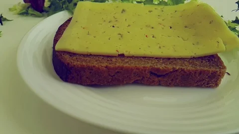 Bread cheese drops slow motion Video stock 89710957