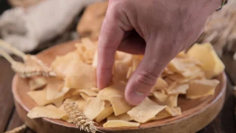 Bread chips, a typical appetizer for aperitivo, dinner in southern Italy and Video stock 213931427