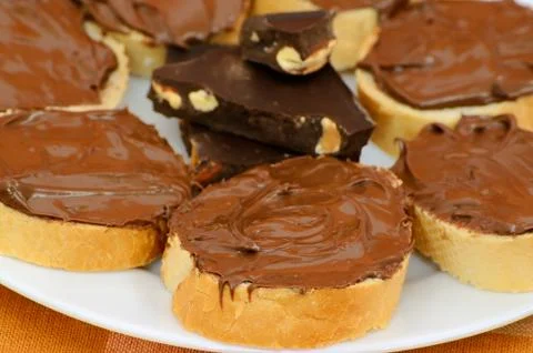 Bread with chocolate cream Stock Photos