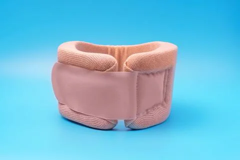 Bread collar for neck support blue background Stock Photos