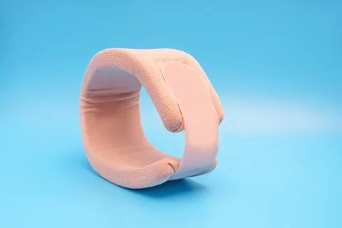 Bread collar for neck support blue background Stock Photos