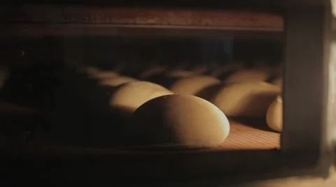 The bread on the conveyor oven. Bread bakery food factory Stock Footage 58586286