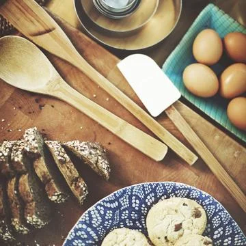 Bread, cookies eggs and kitchen things Stock Photos