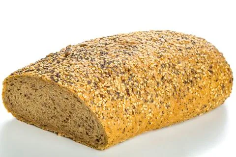 Bread covered with different types of seeds isolated on white Stock Photos