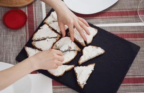 Bread with cream cheese Stock Photos