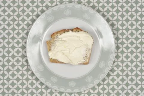 Bread with a creamy white spread 스톡 사진