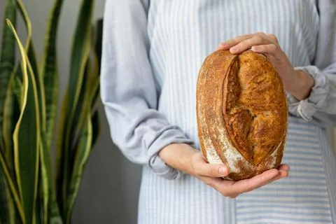 Bread with a crispy crust is beautiful and appetizing, delicious bread lies on a Stock Photos