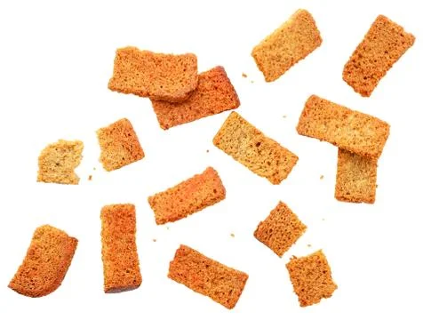Bread croutons fly on a white background. Isolated Stock Photos