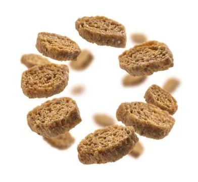 Bread croutons levitate on a white background Foto stock