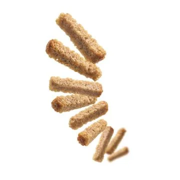 Bread croutons levitate on a white background Stock Photos