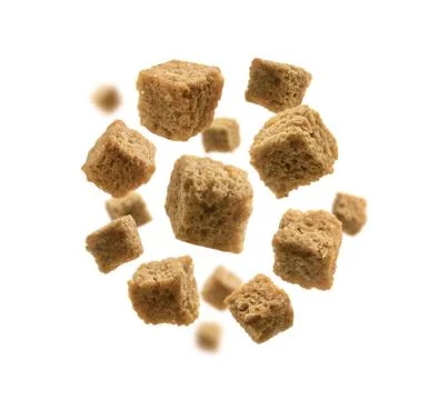 Bread croutons levitate on a white background Foto stock