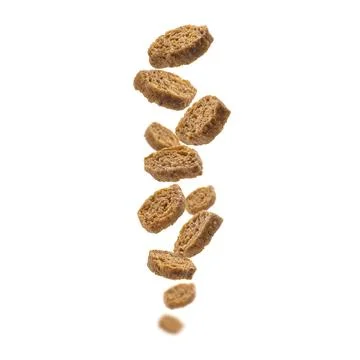 Bread croutons levitate on a white background Foto stock
