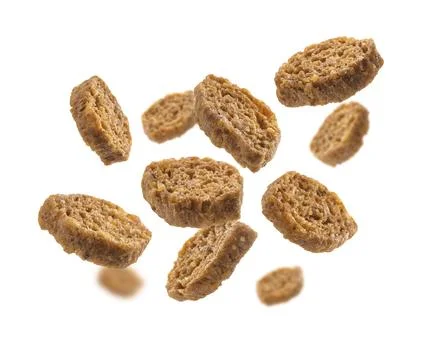 Bread croutons levitate on a white background Foto stock