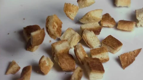 Bread Cubes Falling on white surface Gluten Free, Slow Motion 1000fps Stock Footage 149186271