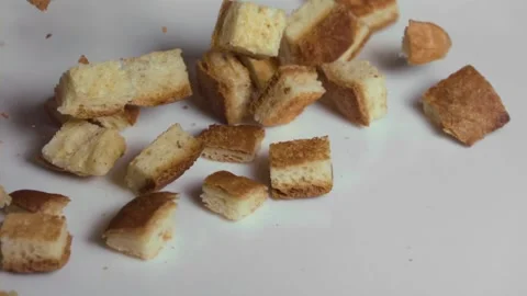 Bread Cubes Falling on white surface Gluten Free, Slow Motion 1000fps Stock Footage 149186305