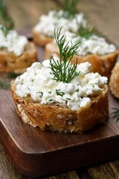 Bread with curd cheese and dill Stock Photos