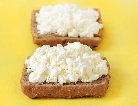 Bread with curd cheese Stock Photos