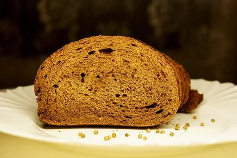Bread. custard rye brown bread. bread in section inside in front view Stock Photos