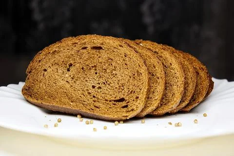 Bread. Custard rye brown bread. bread cut into pieces Stock Photos