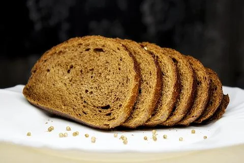 Bread. Custard rye brown bread. bread cut into pieces Stock Photos