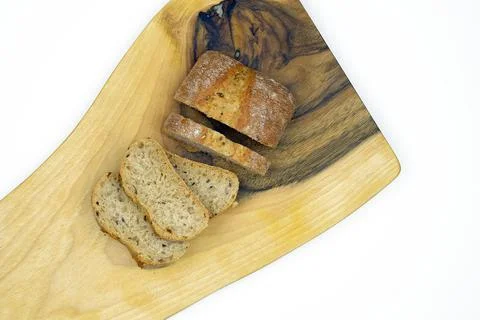Bread on a cutting board isolate. Stock Photos
