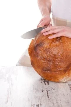 Bread cutting. Stock Photos