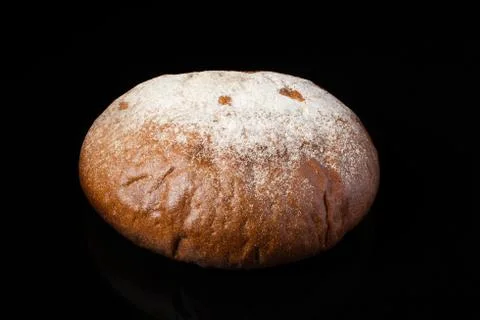 Bread on a dark background.Loaf Stock Photos