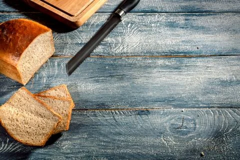 Bread on dark wooden background Stock Photos