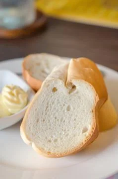 Bread on dish Foto stock