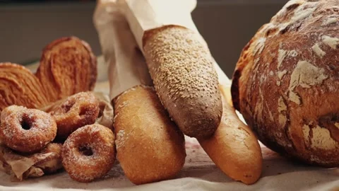 Bread displayed by the baker, assortment of Spanish baguette and traditional Video stock 235287459