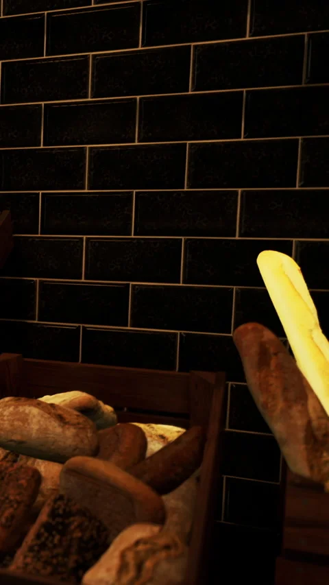 Bread displayed in bakery with dark wall and wooden stand Stock Footage 340633454