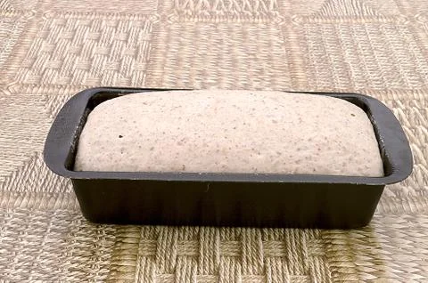 Bread dough in the baking mold Stock Photos