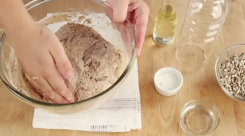 Bread dough being covered to rise Video stock 24672962