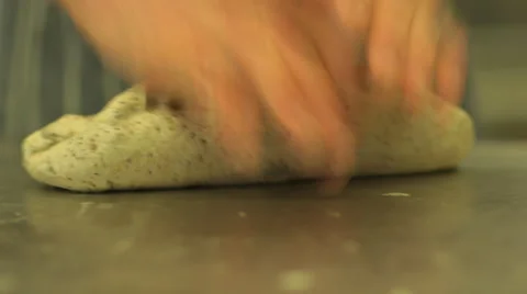 Bread dough being kneaded in a bakery Video stock 46942779